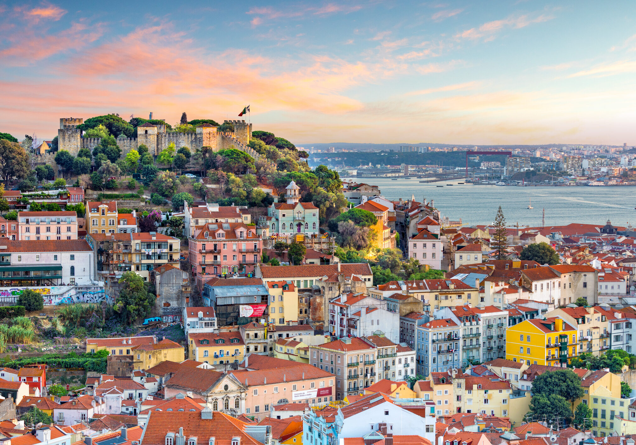 Lisbon, Portugal skyline at Sao Jorge Castle at sunset.